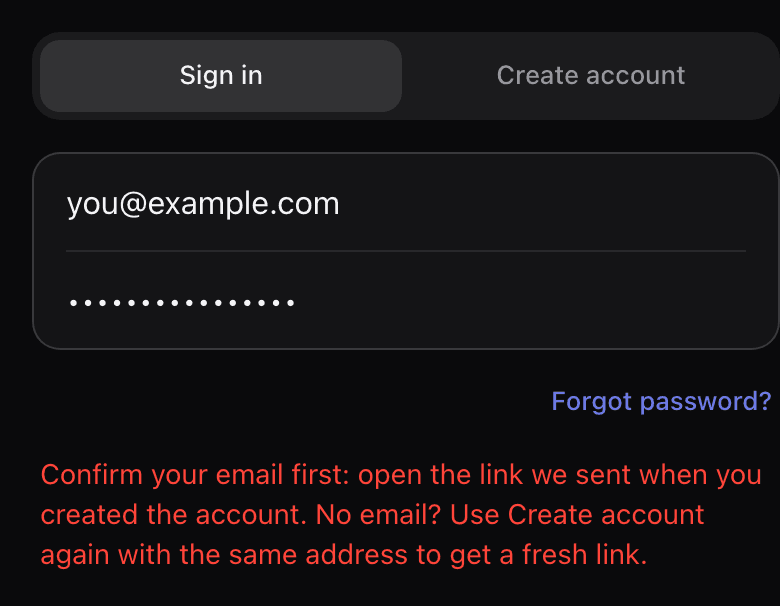 The Sign in tab with an email and password entered and a red message: Confirm your email first, open the link we sent when you created the account